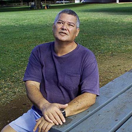 Picture of Samuel Nowlin Reeves, Jr. in a blue t-shirt.